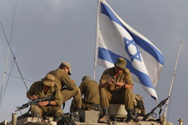 Israeli soldiers at a staging area on the Israel Gaza border. Picture: AP