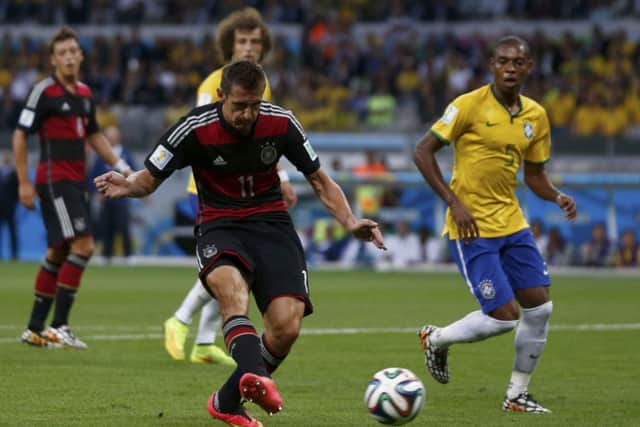 Miroslav Klose became the leading World Cup goalscorer. Pictures: Reuters