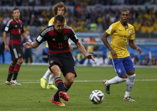 Miroslav Klose became the leading World Cup goalscorer. Pictures: Reuters