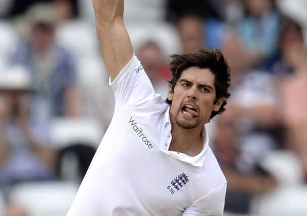 Under-fire England captain Alastair Cook enjoyed more success with the ball than the bat. Picture: Reuters