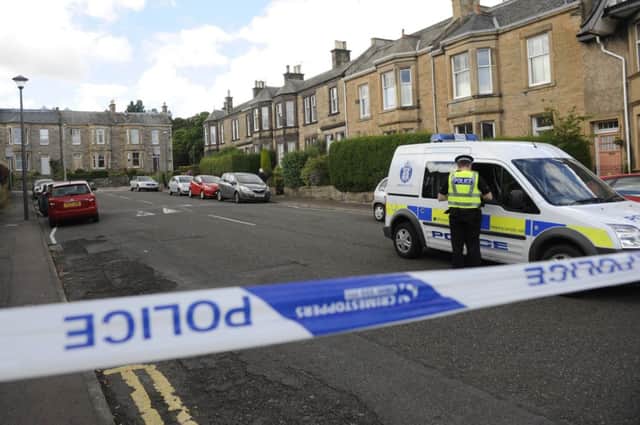 Police cordoned off a street in the Morningside area of Edinburgh following the assault. Picture: Greg Macvean