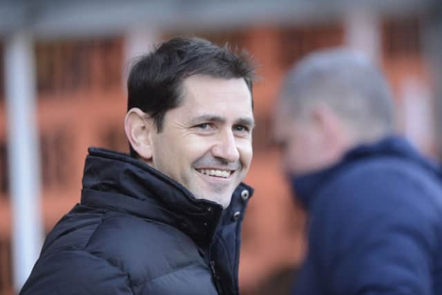 Jackie McNamara believes the defender will "fit in well" at Tannadice. Picture: Phil Wilkinson