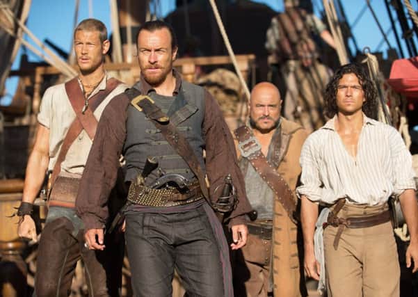Toby Stephens, second left, in Black Sails. Picture: Eric Magnussen