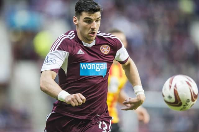 Paterson played 37 league games for Hearts last season in a variety of positions. Picture: Ian Georgeson