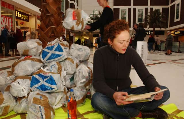 Katie Orton of Edinburgh College of Art with her art installation of Surplus Shopping Bags. Picture: TSPL