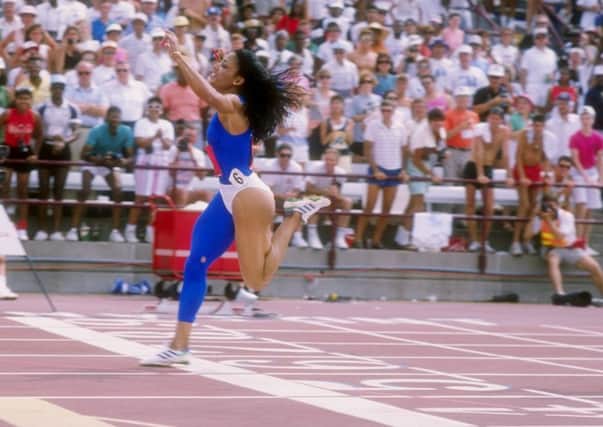 On this day in 1988, US sprinter Florence Griffith Joyner set a new world record of 10.49 seconds for the womens 100 metres. Picture: Getty