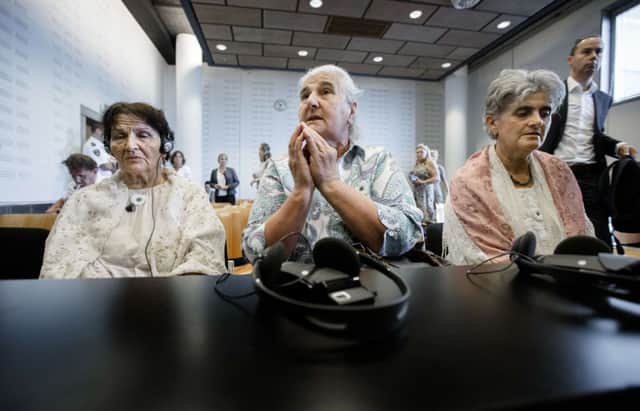 Representatives of Mothers of Srebrenica await the courts adjudication at The Hague yesterday. Picture: Getty