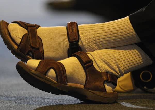 Whoever decided it was taboo to wear socks with sandals has had their dictat well and truly overturned. Picture: Getty