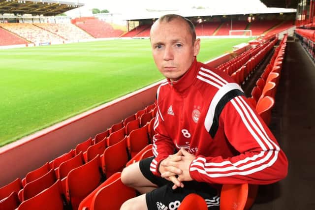 Willo Flood is convinced that team-mate David Goodwillie will make a big impact at Aberdeen. Picture: SNS