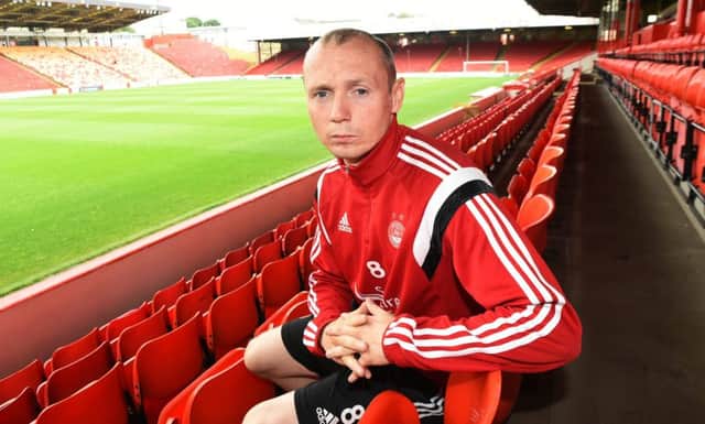 Willo Flood is convinced that team-mate David Goodwillie will make a big impact at Aberdeen. Picture: SNS