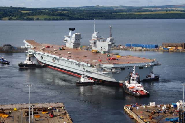 The HMS Queen Elizabeth has been successfully floated out of the dock. Picture: Julian Hickman