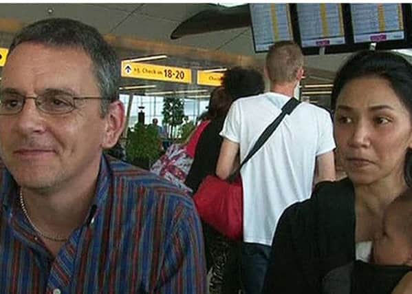 Barry Sim and his wife Izzy and their baby, who were due to fly on MH17. Picture: PA/BBC