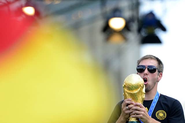 Germany's captain Philipp Lahm celebrates with the World Cup during a victory parade in Berlin. Picture: Getty