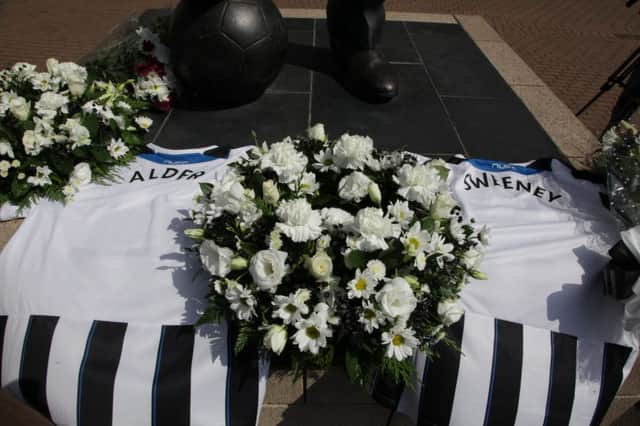 The first tributes for the two Newcastle supporters who were on board flight MH17. Picture: SWNS