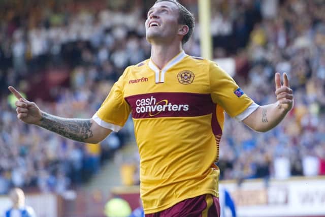 Josh Law celebrates opening the scoring against Stjarnan. Picture: SNS