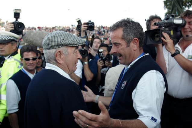 European team captain Sam Torrance celebrates with his father Bob after victory in the Ryder Cup at The Belfry. Picture: Actionplus