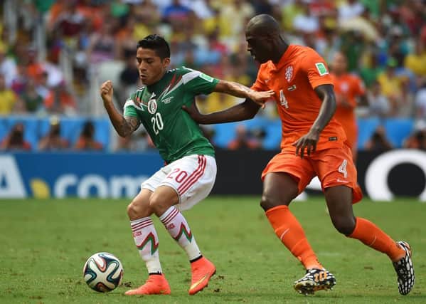 Celtic loan target Javier Aquino came on for Mexico at the World Cup in Brazil. Picture: Getty