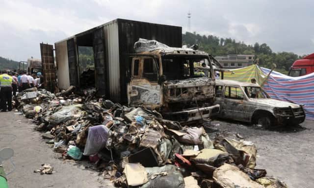 The scene of the crash which happened early yesterday morning in Hunan province. Photograph: Reuters