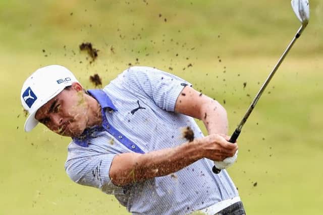 Rickie Fowler briefly pulled level with Rory McIlroy yesterday, but will start six shots behind today. Picture: Getty