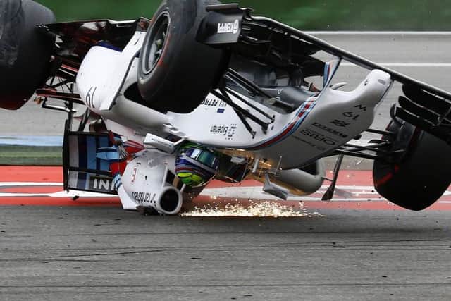 Williams driver Felipe Massa crashes spectacularly at the first corner at Hockenheim. Picture: Reuters