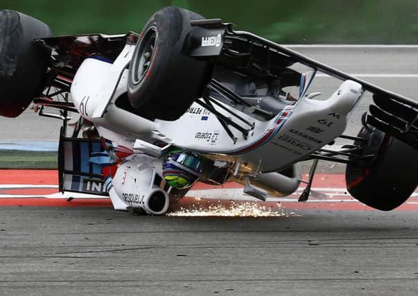 Williams driver Felipe Massa crashes spectacularly at the first corner at Hockenheim. Picture: Reuters