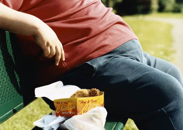 Britains obesity problem is forcing the NHS to spend more. Picture: PA