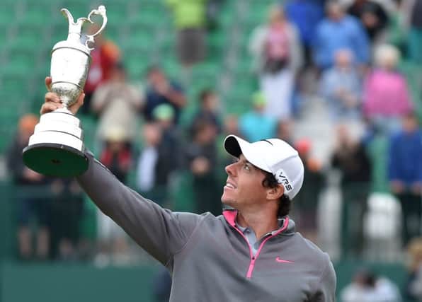 Rory McIlroy holds up the Claret Jug at Royal Liverpool. Picture: Getty