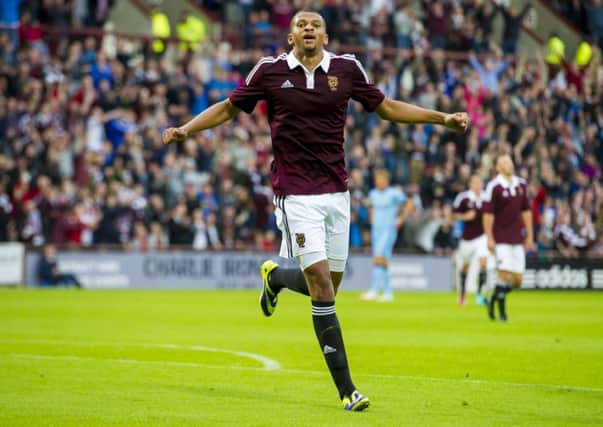 Osman Sow celebrates equalising against Manchester City. Picture: SNS