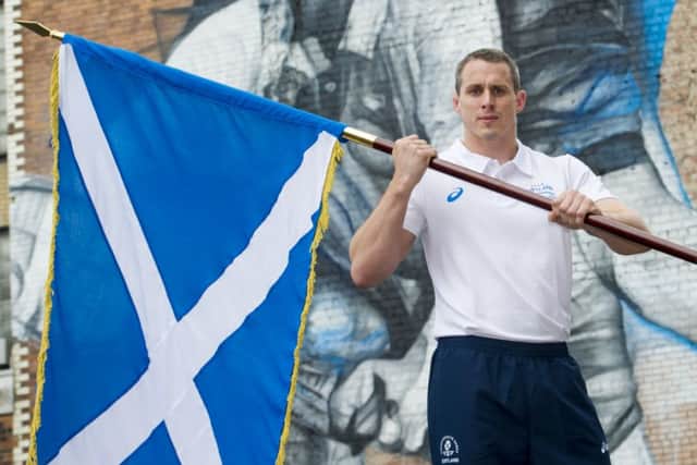 Euan Burton has been chosen to carry the Scottish flag and lead Team Scotland into the Opening Ceremony of the 2014 Commnwealth Games. Picture: SNS