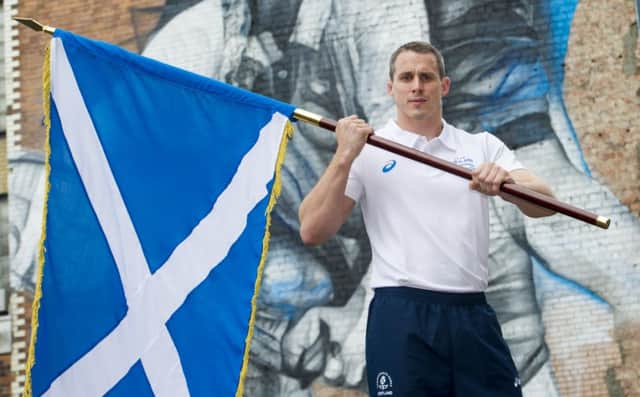 Euan Burton has been chosen to carry the Scottish flag and lead Team Scotland into the Opening Ceremony of the 2014 Commnwealth Games. Picture: SNS