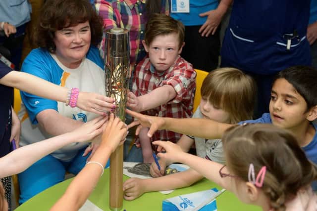 Singer Susan Boyle at Yorkhill Childrens Hospital, Glasgow with the Queen's Baton. Picture: Hemedia