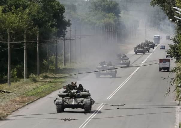 As Ukrainian tanks rolled through Konstantinovka yesterday, Vladimir Putin trained his fire on Kiev. Picture: Reuters