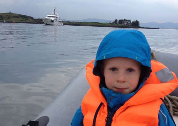 Oban youngster Ruari Cottier was taken out to the superyacht by dinghy to deliver his letter