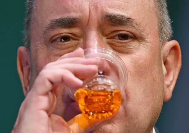 Alex Salmond attends a media conference at the Commonwealth Games media centre yesterday. Picture: Getty