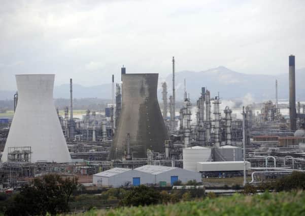 The resumption of production at the Grangemouth oil refinery following its temporary closure has helped to boost figures. Picture: TSPL