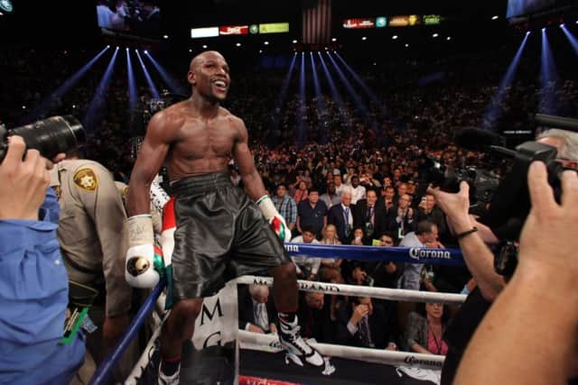 Under the new deal, TalkTalk customers will get greater access to Skys coverage of boxing. Picture: AFP/Getty Images