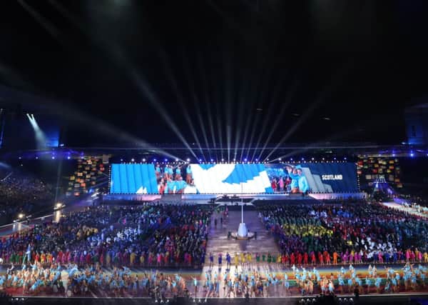 Team Scotland enter the arena at Celtic Park. Picture: AP