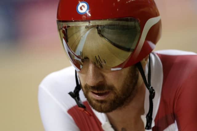 British cyclist Bradley Wiggins rides past during a training session at the Sir Chris Hoy Velodrome at the Emirates Arena. Picture: Getty