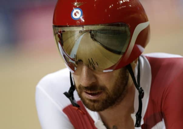 British cyclist Bradley Wiggins rides past during a training session at the Sir Chris Hoy Velodrome at the Emirates Arena. Picture: Getty