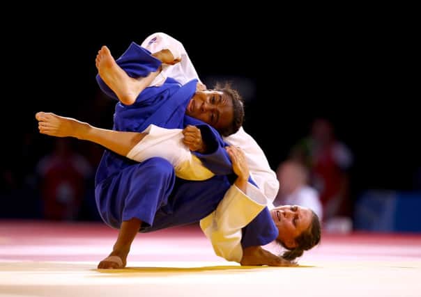 Kimberley Renicks of Scotland beats Marcelle Monabang of Cameroon (blue) in the Women's 48kg Judo Quarter Finals. Picture: Getty