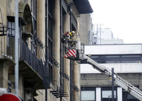 A fire damaged the Mackintosh building of the Glasgow School of Art, but it was eventually saved by firefighters. Picture: TSPL