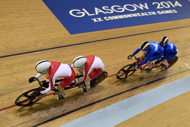 England's Sophie Thornhill and Helen Scott race ahead of Scotland's Louise Haston and Aileen McGlynn. Picture: Getty