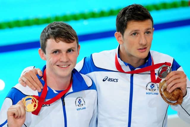 Ross Murdoch, left, and Michael Jamieson took gold and silver on a memorable opening day of action. Picture: Ian Rutherford
