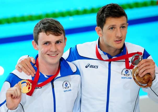 Ross Murdoch, left, and Michael Jamieson took gold and silver on a memorable opening day of action. Picture: Ian Rutherford
