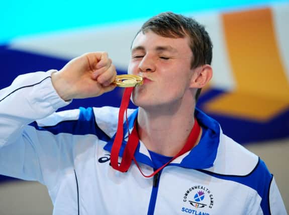 Ross Murdoch cant hide his joy at winning gold in the 200m breaststroke. Picture: Ian Rutherford