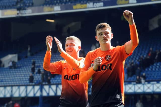 Andrew Robertson, right, has followed Ryan Gauld out of the Tannadice exit. Picture: Lisa Ferguson