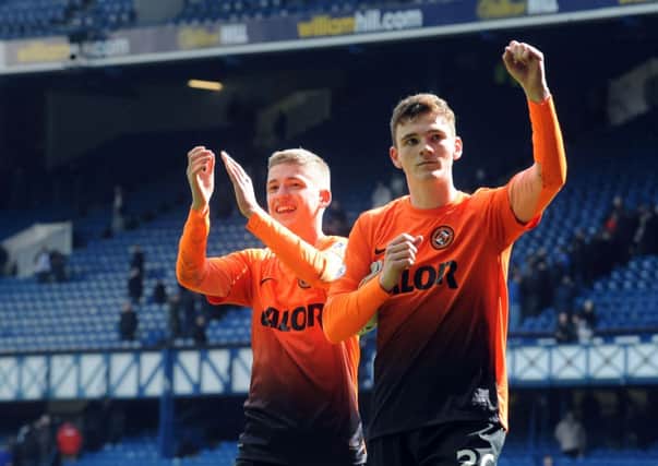 Andrew Robertson, right, has followed Ryan Gauld out of the Tannadice exit. Picture: Lisa Ferguson