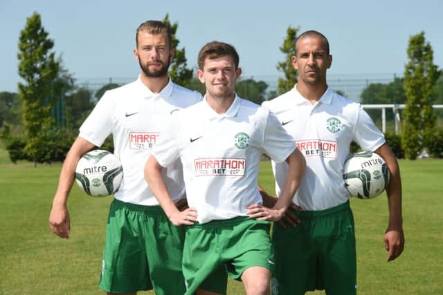 Jordon Forster (left), Sam Stanton and Farid El Alagui model the new Hibernian away kit. Picture: SNS