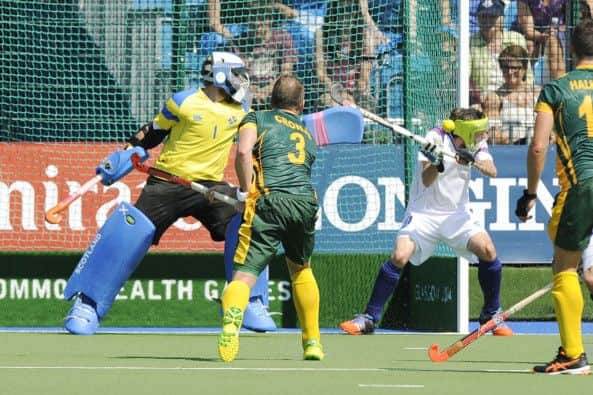 Ross Stott is hit by the ballSouth Africa - Andrew Cronje shoots a penalty corner. Picture: Greg Macvean