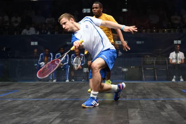 Alan Clyne in action yesterday against Kevin Hannaway. Picture: John Devlin